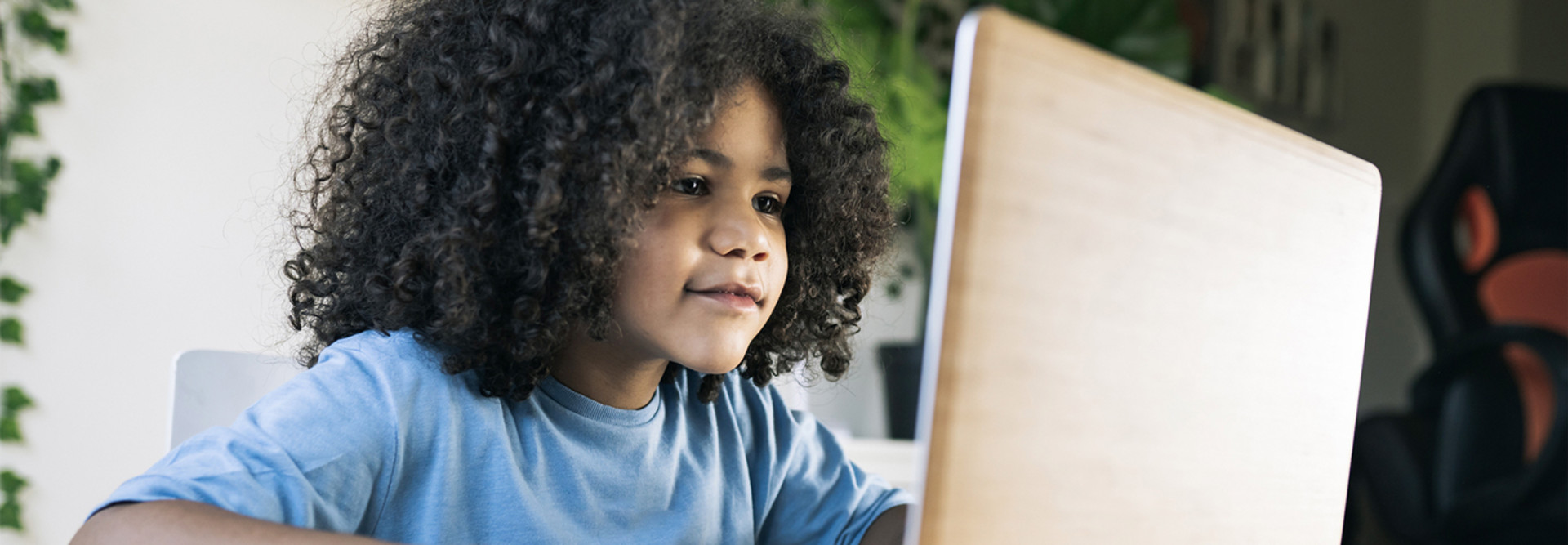 Young student using laptop