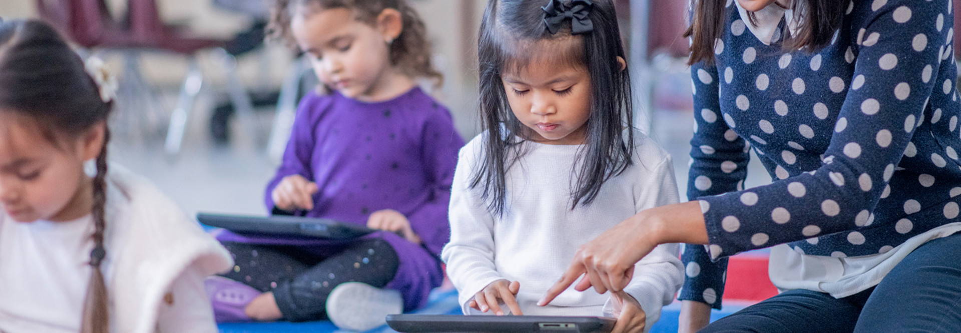 Students using tablet in class