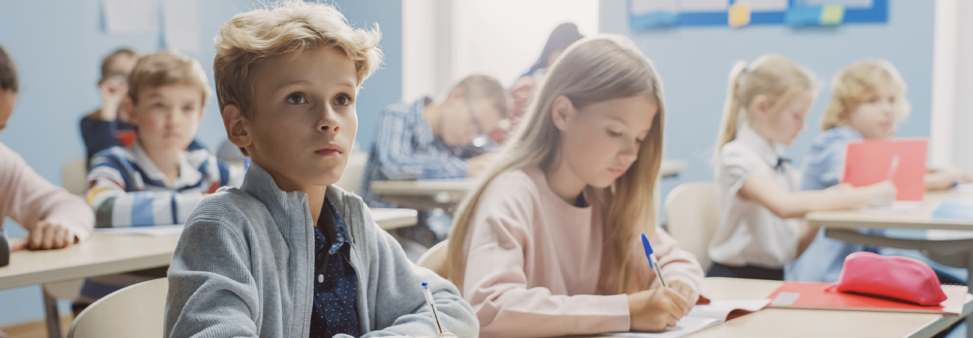 Elementary students learning in classroom