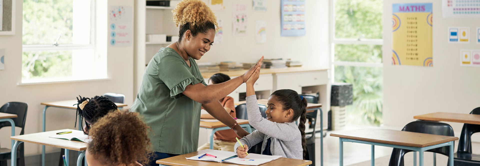Teacher helps and supports student