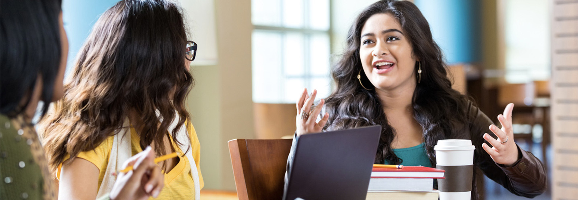 Students studying in library
