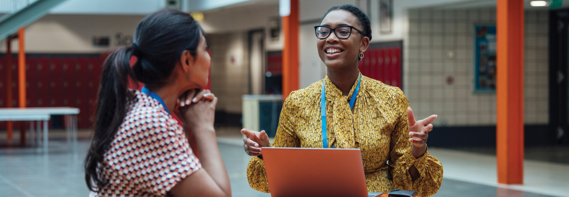 teacher and IT person talking