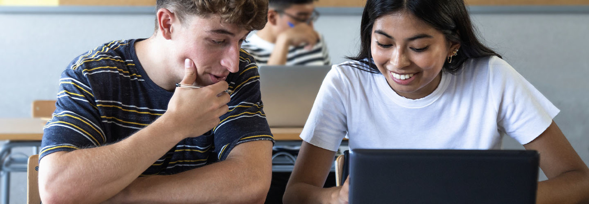 Students working together using computer