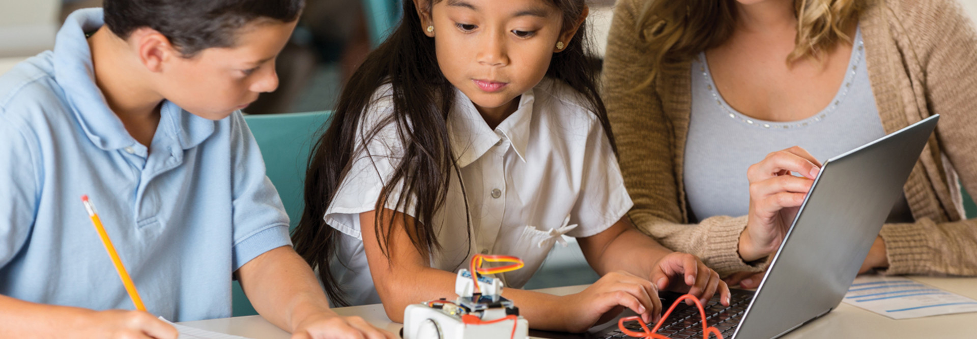 School students work on robotics