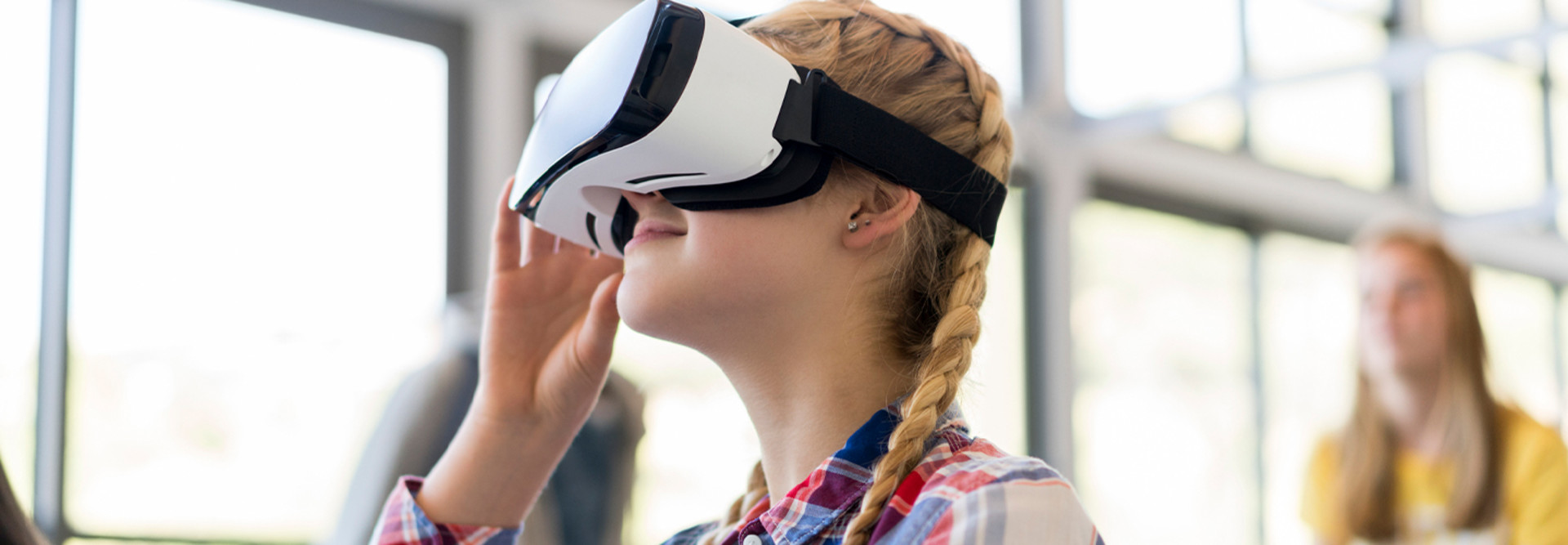 Student wearing virtual reality glasses