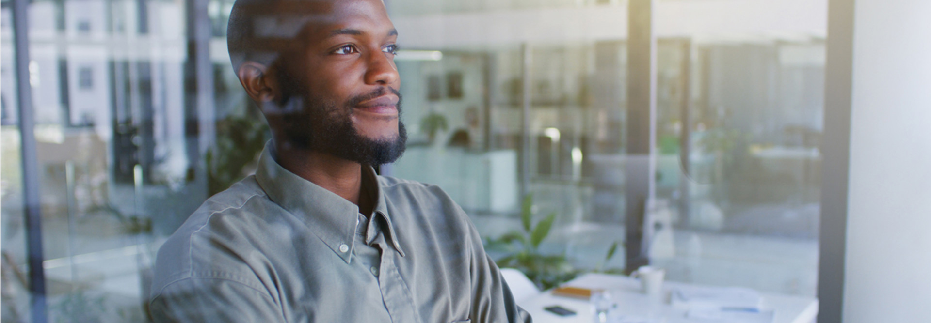 Person looking out of office
