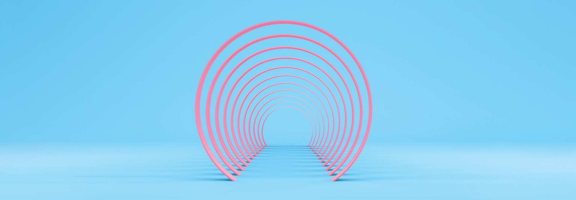 illustration of receding pink arches on a blue background