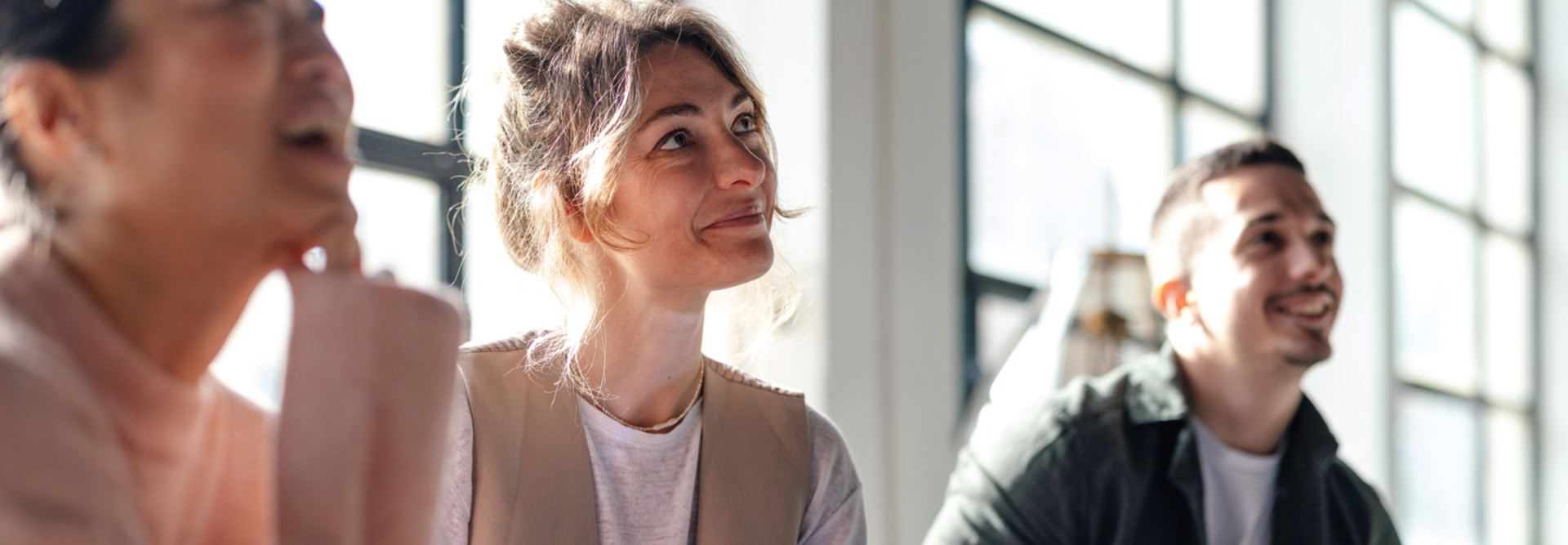 Young Professionals Collaborating in Modern Co-Working Space