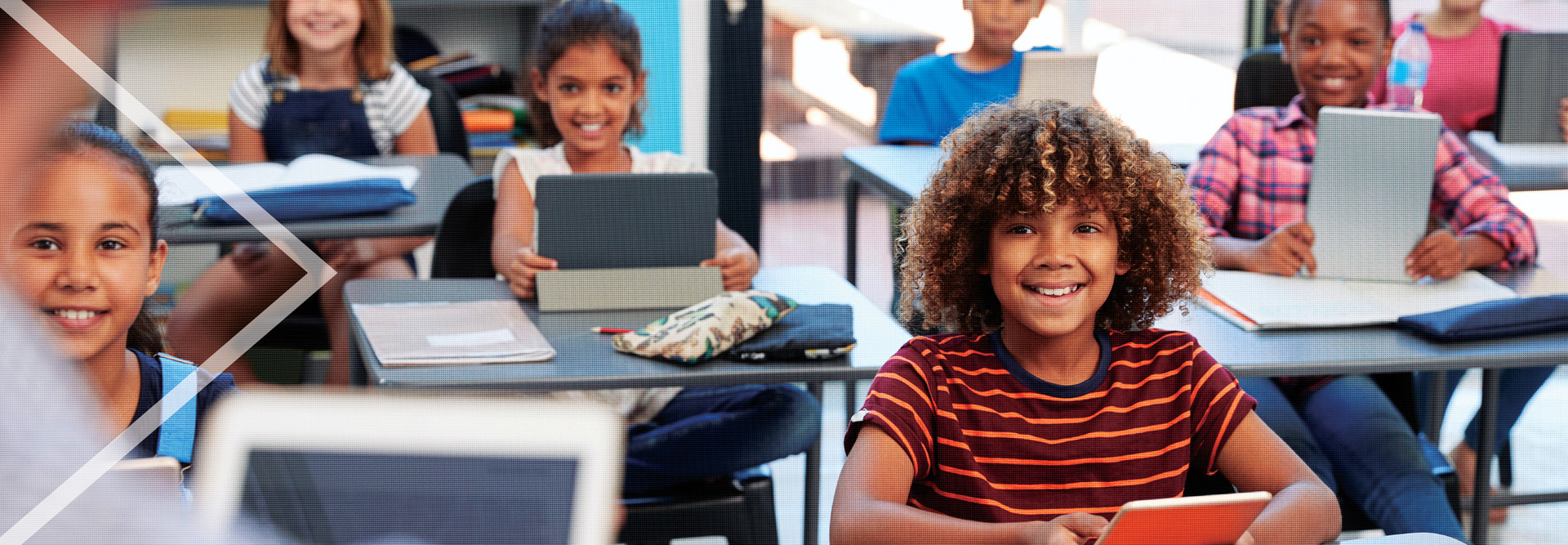 Students using tech in the classroom