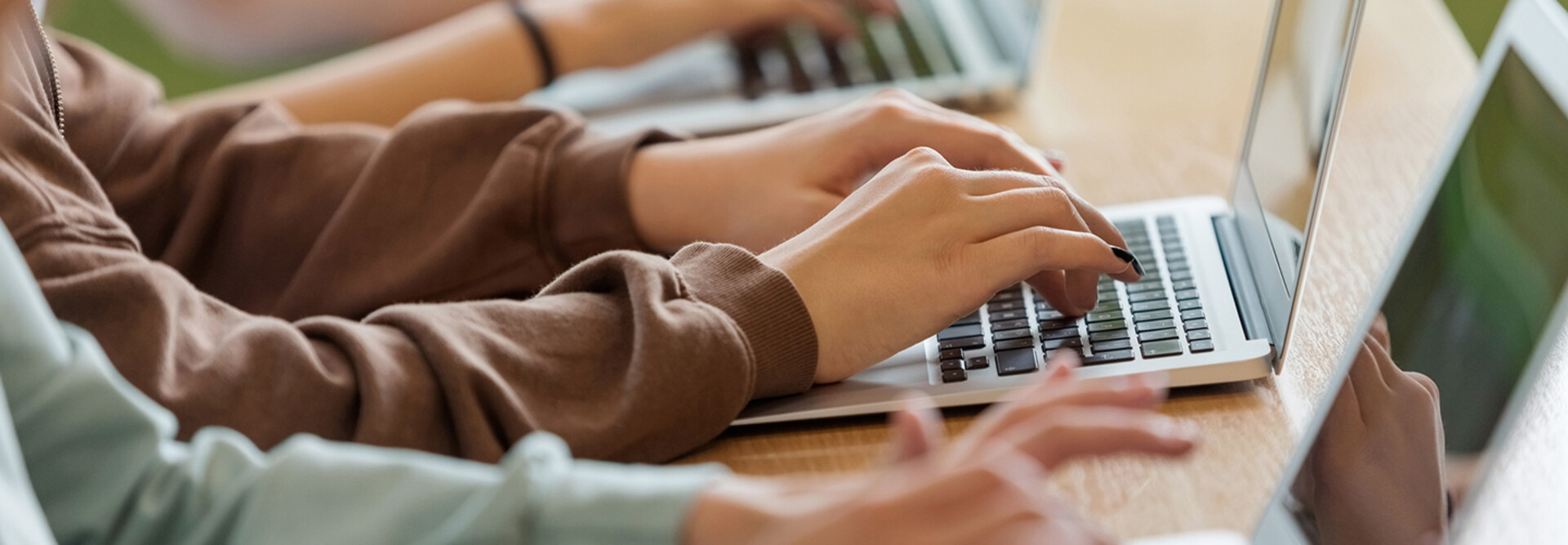 students on laptops