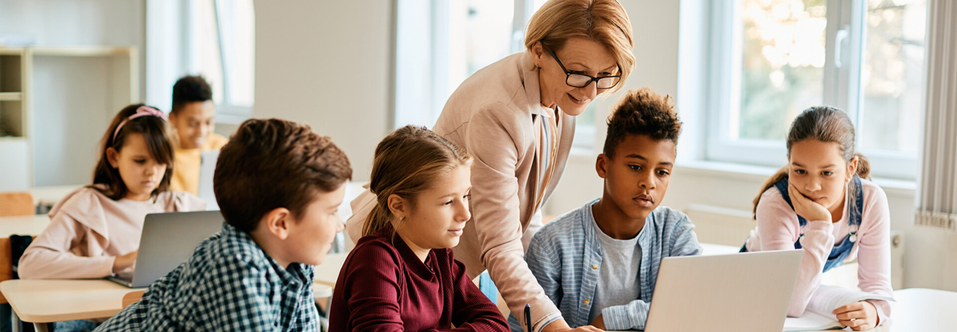 Teacher with students in classroom
