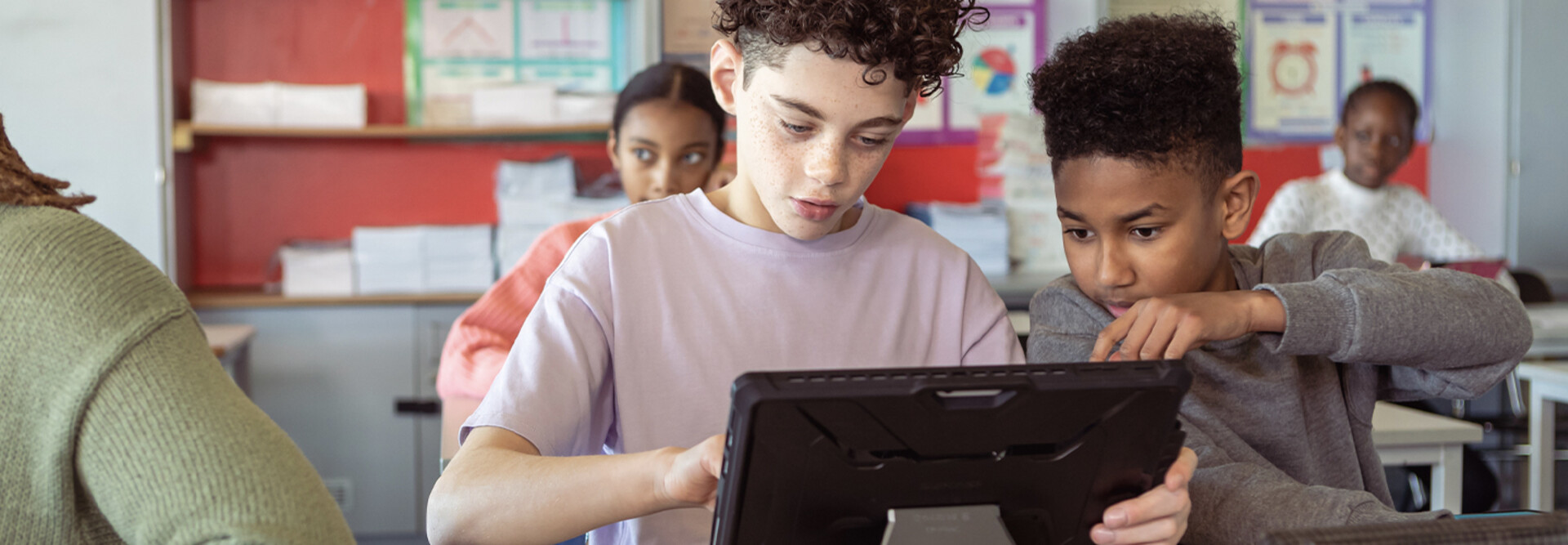 Kids working on group assignment during class