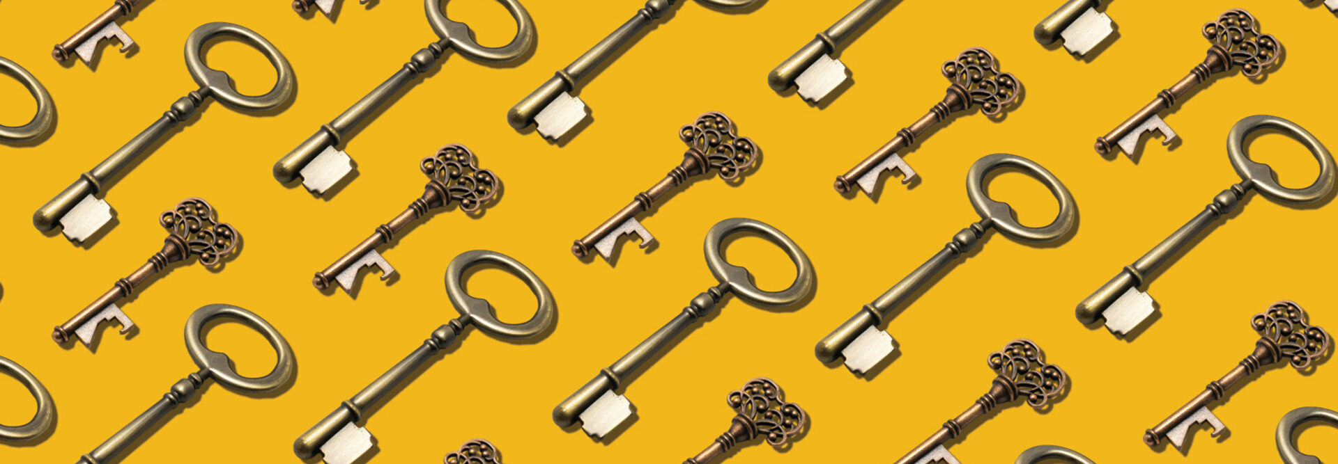 a repeating pattern of keys on a yellow background to represent passkeys