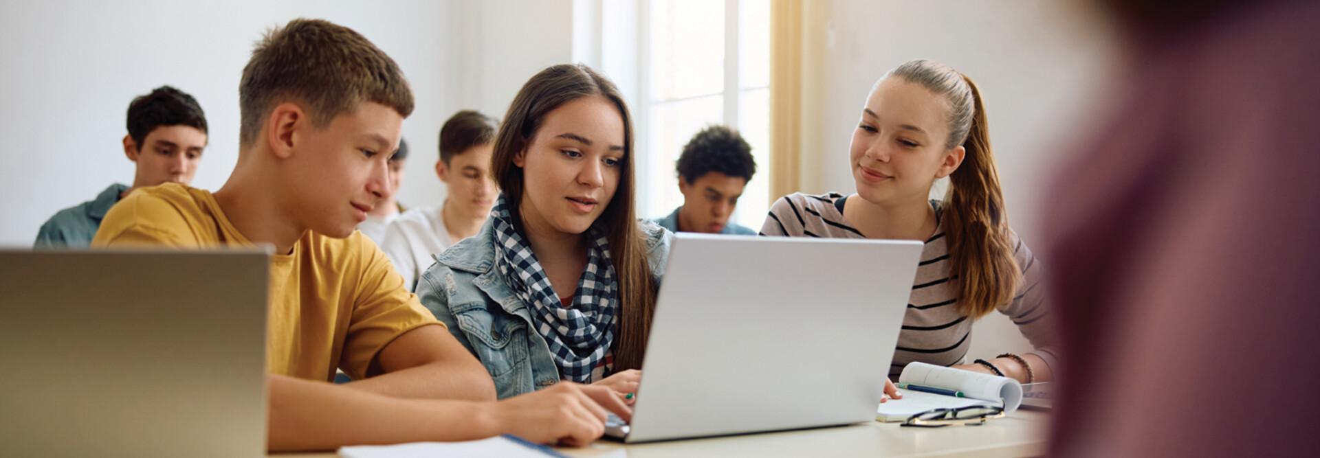 Students collaborating in class