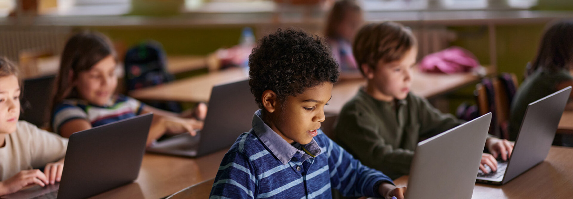 Students using computers in classroom