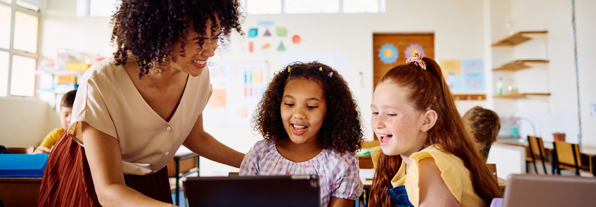 Students using tech in the classroom