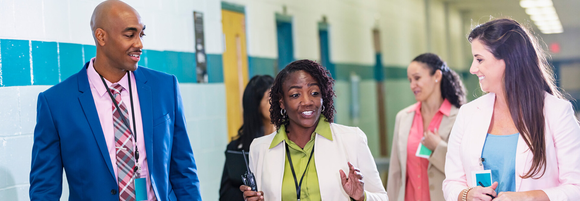 Teachers meeting in the hall