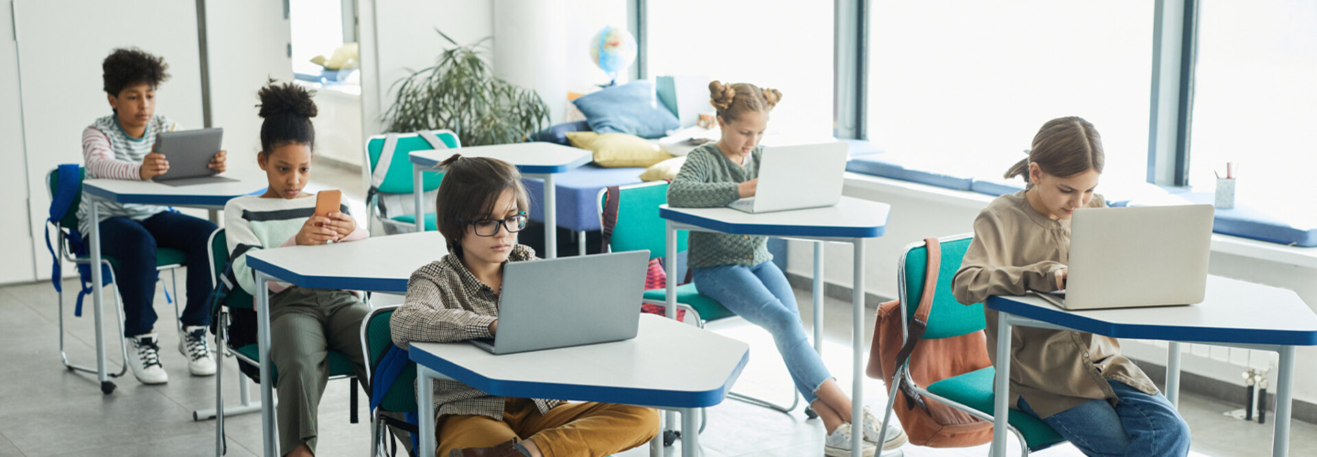 Students using devices in classroom