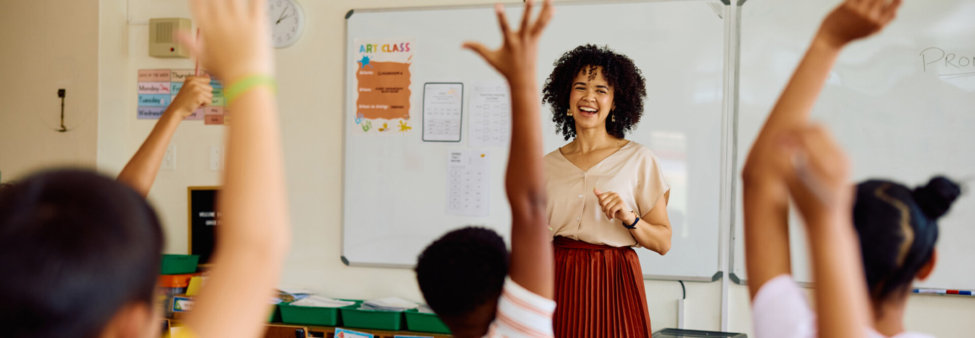 Students raising hands