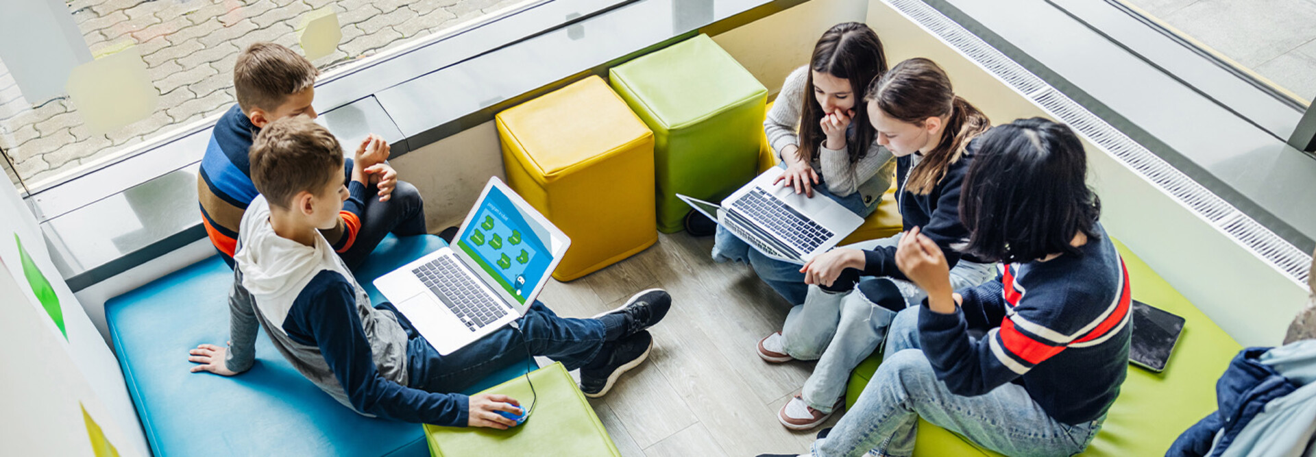Students using computer in classroom
