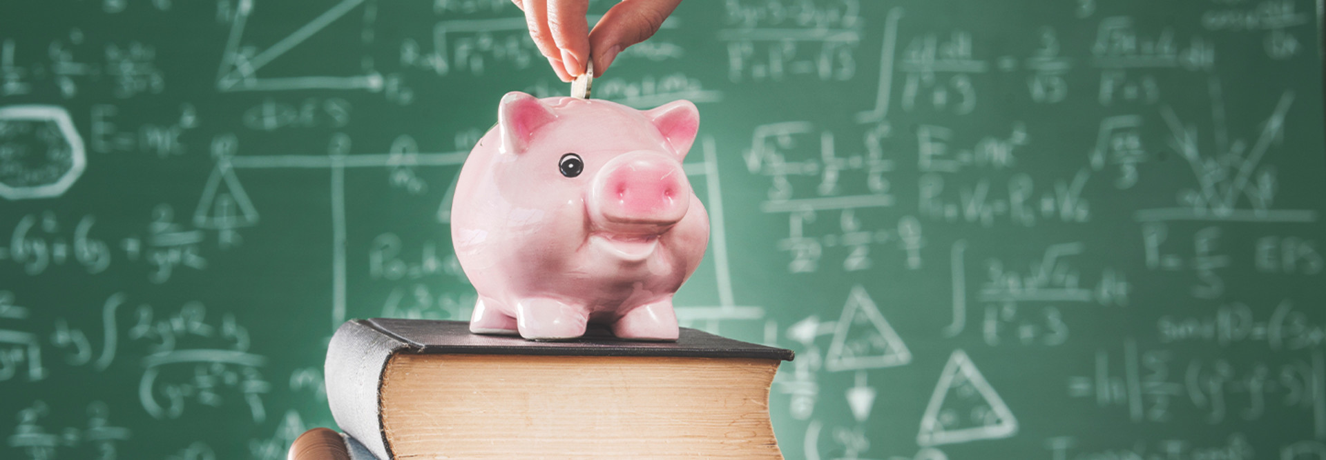 piggy bank on a stack of books