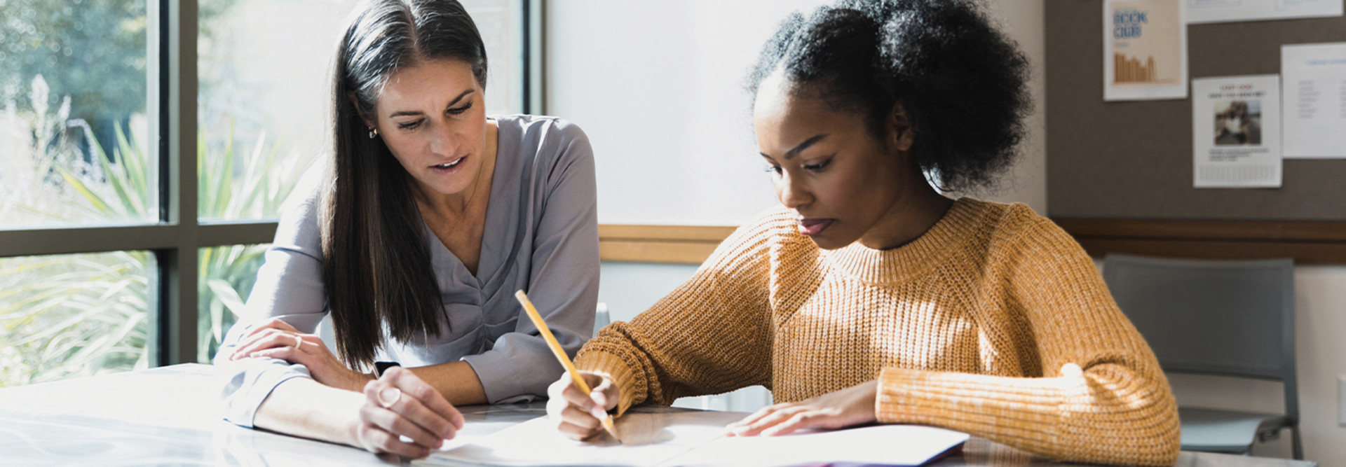 Student and teacher working one-on-one