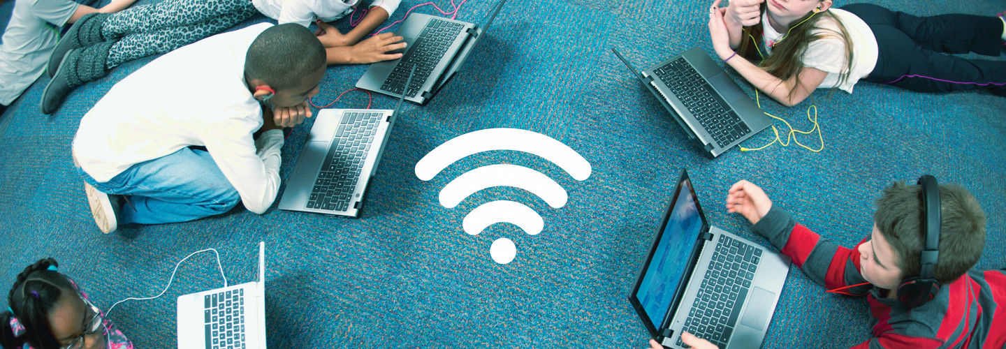 students using wifi with wifi symbol on the floor