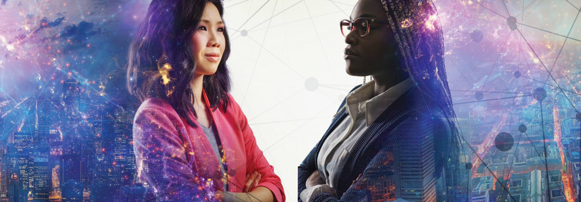 Image shows two women looking at each other with their arms crossed and a cityscape behind them