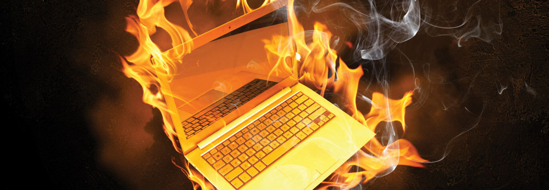 computer generated image of laptop on fire