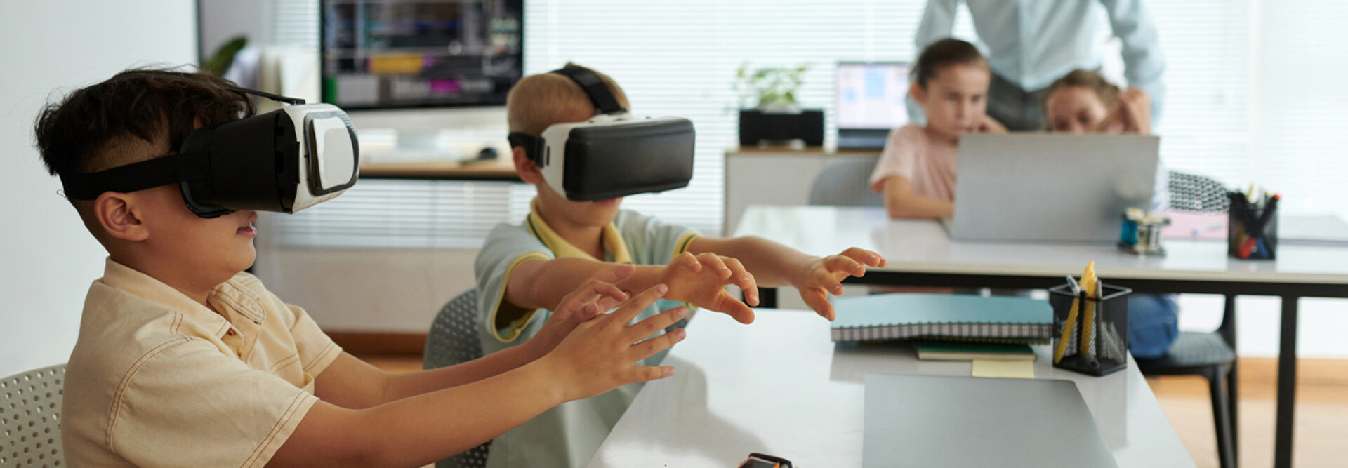Kids using VR headsets