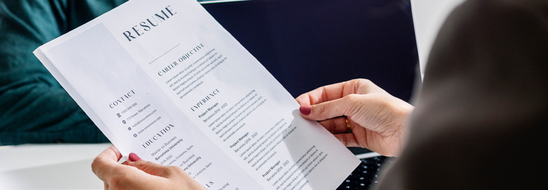 Person reviewing resume