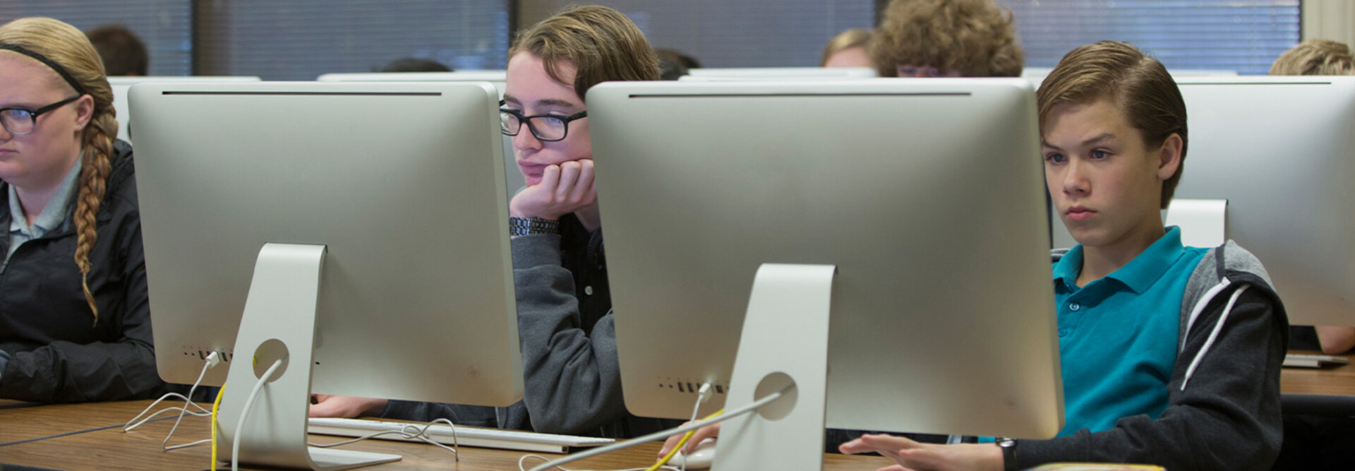 Students using computers in school