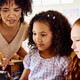 School teacher helping students