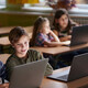 Students using computers in class