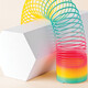 Flexible Multi Colored Coil Striding Hexagon Shape on White Background