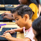 Students using tech in classroom