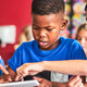 Teacher helping students