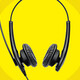 Headphones on a yellow background