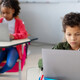 Students using devices in class