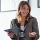 Professional holding a tablet