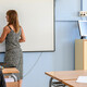 Teacher using interactive whiteboard