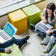 Students using computer in classroom
