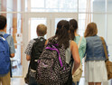 students walking the hall