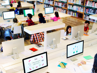 Kids in high tech library