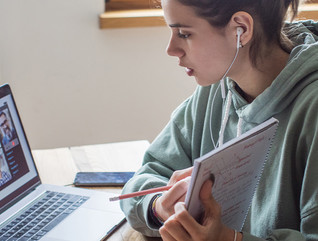 girl student learning from home using laptop