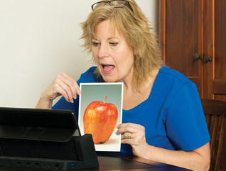 woman doing speech-language therapy online