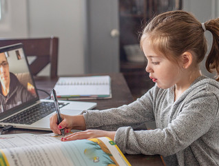 girl studying online from laptop