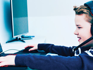 Boy playing esports at home