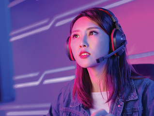 High school esports athlete engaged in an online game