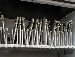 Laptops in a device charging technology cart in the K–12 classroom